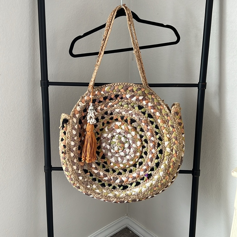Hand made jute bag.  Gorgeous unique piece. Great for the beach.